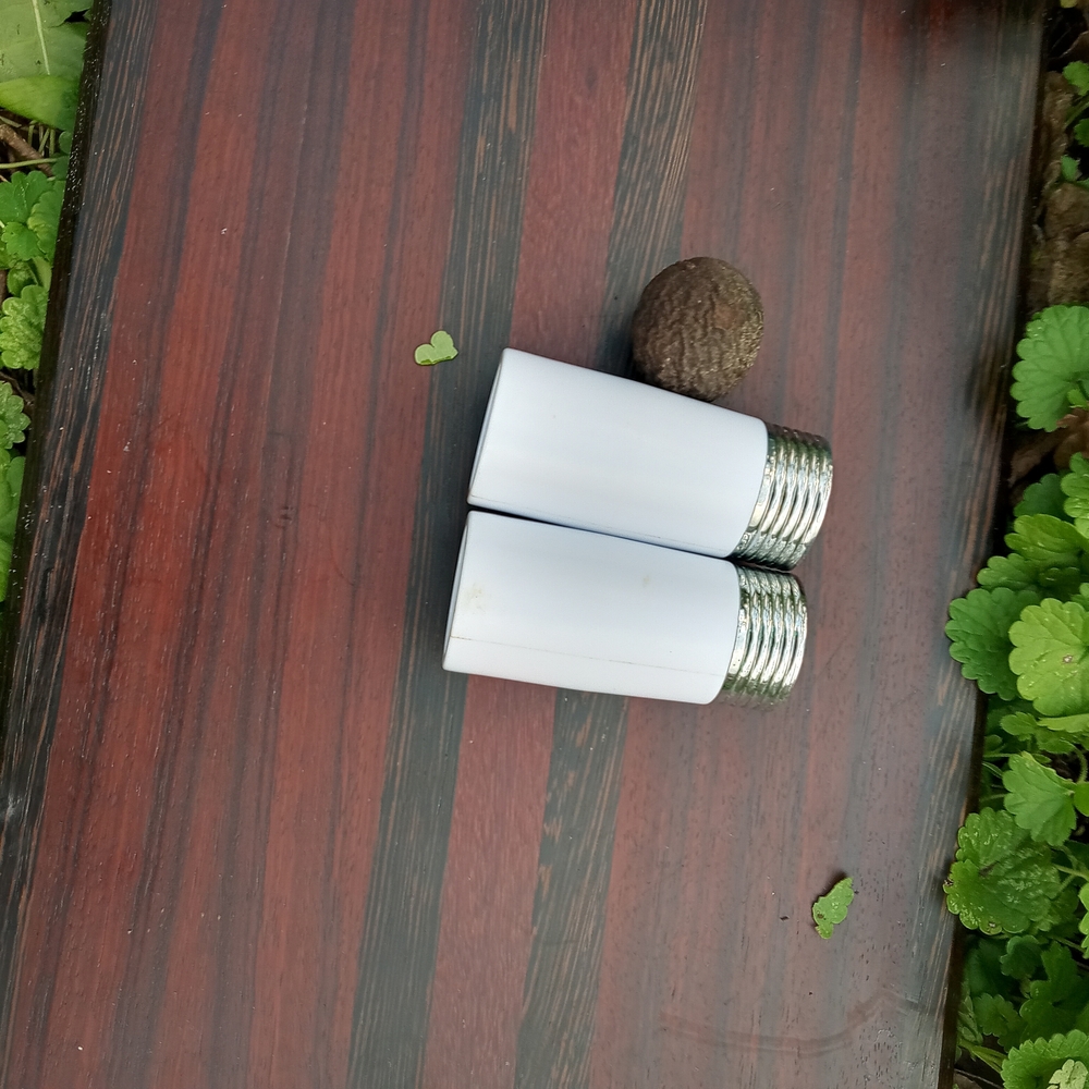 White and Silver Salt and Pepper Shakers